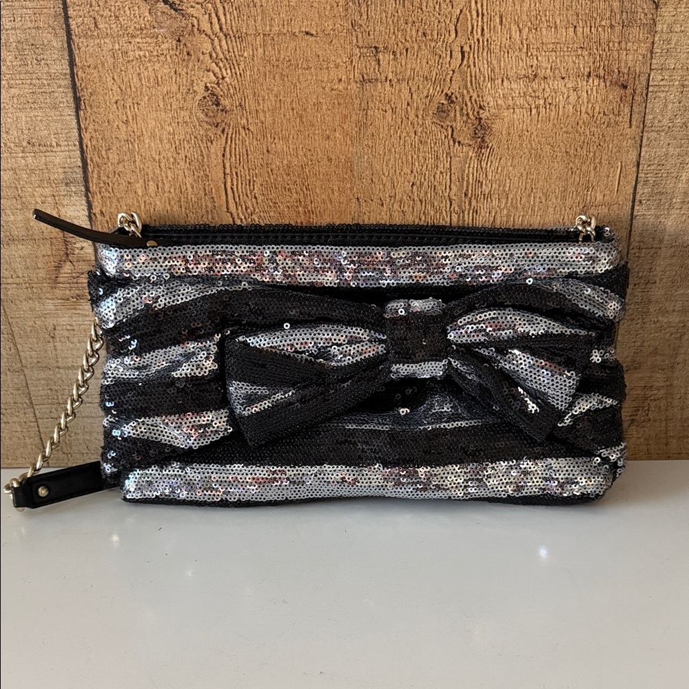 Kate Spade E.B. Night Sky sequin striped evening bag with bow accent